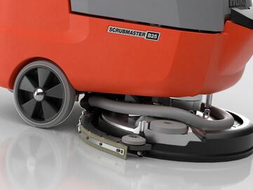 Automatische werkzeugloser Bürstenabwurf erleichtert tägliche Service Arbeiten an der Bodenreinigungsmaschine Hako Scrubmaster B25 von Stangl